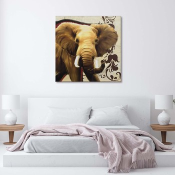 Adult elephant on a beige background